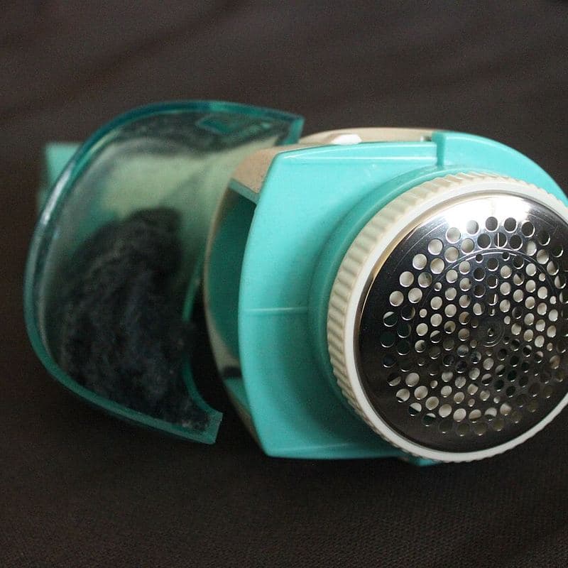 Fabric shaver on a garment