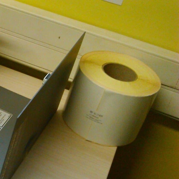 Roll of thermal shipping labels