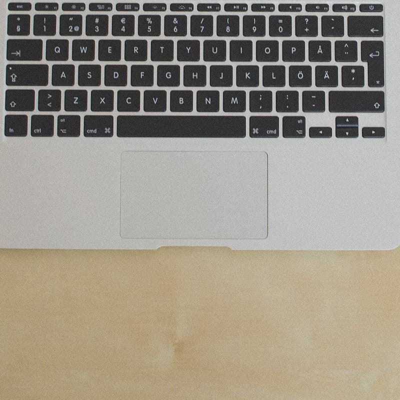 Laptop keyboard on a desk